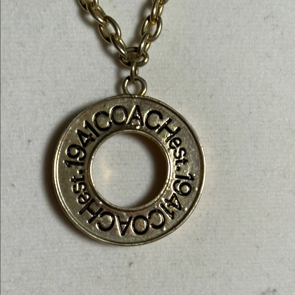 Coach luxury pendant